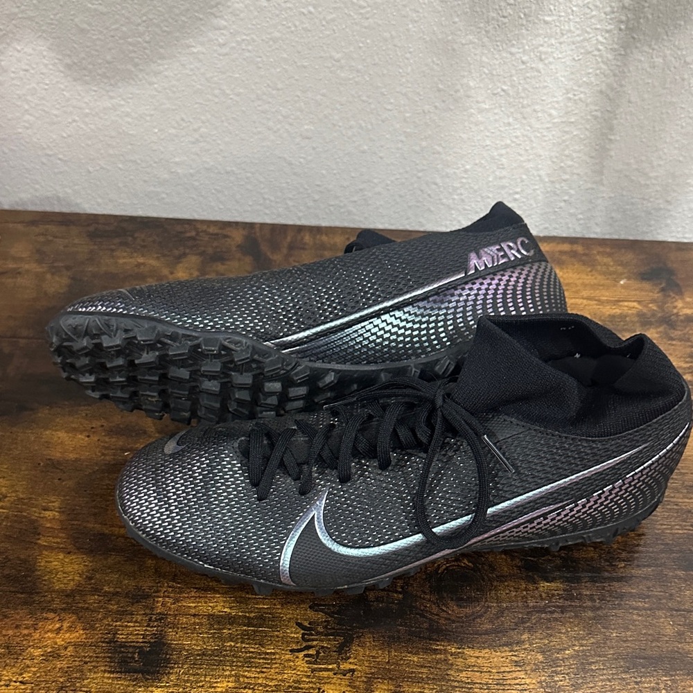 Nike Black and Silver soccer cleats turf